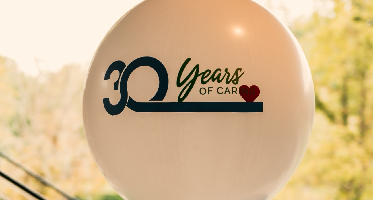 A 30 Years of Caring balloon at Northeast Professional Home Care's anniversary celebration